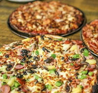 The cave wood fired pizza bar - Click Find