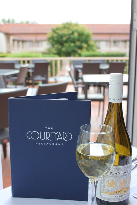 The Courtyard Restaurant - Bet 4u 0