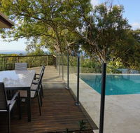Scribbly Gums - Rainbow Beach Ocean-front spacious home with pool - Click Find
