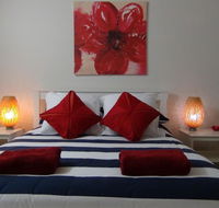 Tranquillity Beach House - Click Find