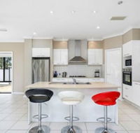 Central Gold Coast Large Modern Elevated Home - Click Find