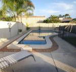 62 Tingira Close Modern lowset home with swimming pool outdoor area ample parking. Pet friendly - Click Find