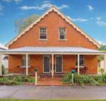Eliza 1875 Red Brick Duplex Townhouse - Lawyer Find