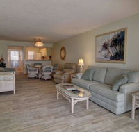 2BR Ground Level Condo with Pool 10 Minutes to Beaches with golf Course Views