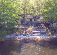 Dreamy Lakefront Getaway with Beach  Hot Tub