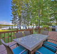 Lakefront Interlochen Home with Deck Fire Pit  Dock