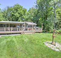 Modern Ranch-Style Home with Fireplace  Large Deck
