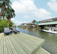 New Listing  The Palms - Canal Home On Double Lot Home
