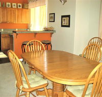 Resort to Relaxation in this Creekside Townhome