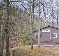 Riverfront Elkins Home with Fireplace  Deck